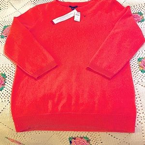 This is a pretty pinkish / lgt  salmon color .100% Cashmere sweater size S NWT